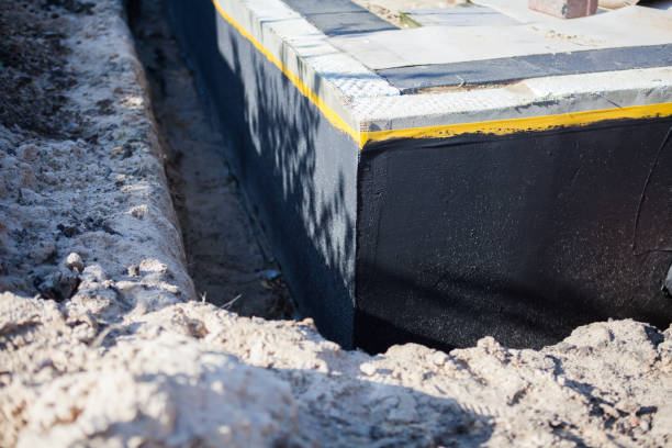 Professional Foundation Crack Repair technician working in Bellwood, PA